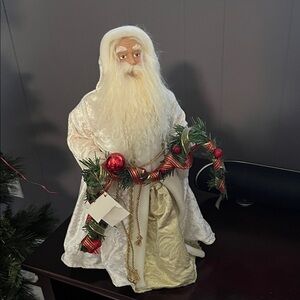 Elegant White Santa Figurine with Red and Green Accents